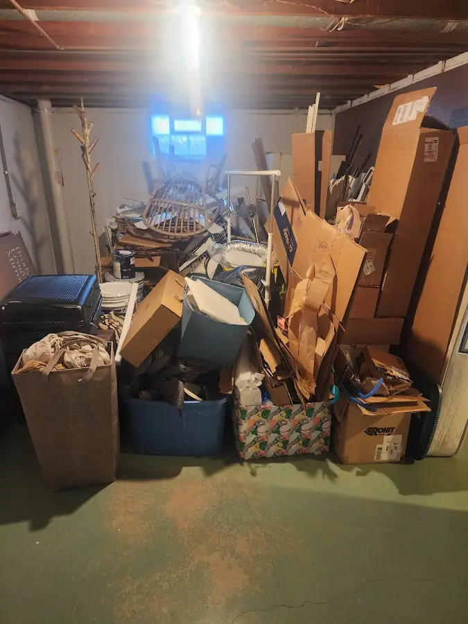 Roll-off dumpster container at job site for 6 Yard Dumpster Rental in Normandy